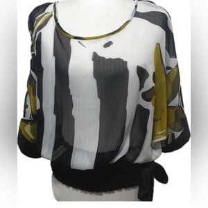 Frank Lyman Design Monochrome Floral Blouse with smocked waist.
